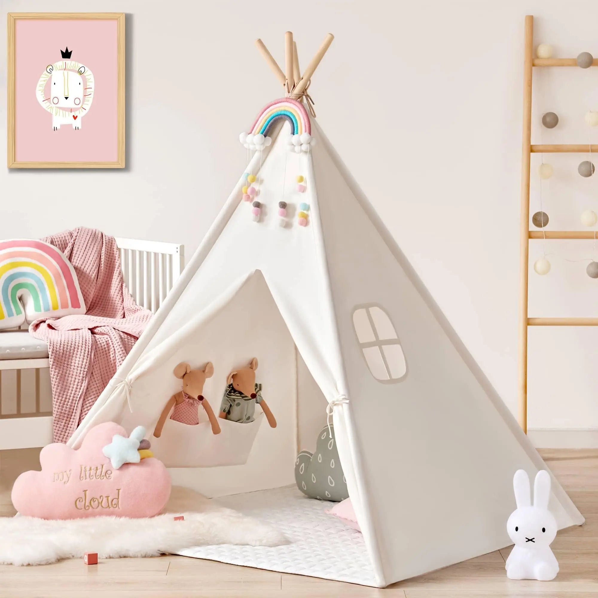 Children's play tent with toys and decorations in a room.